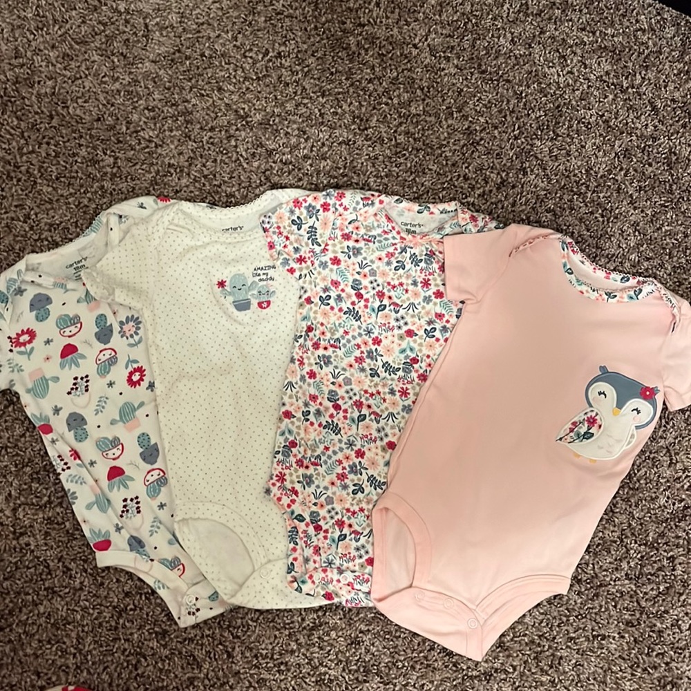 Carter’s Assorted Onesies 4 Piece Set